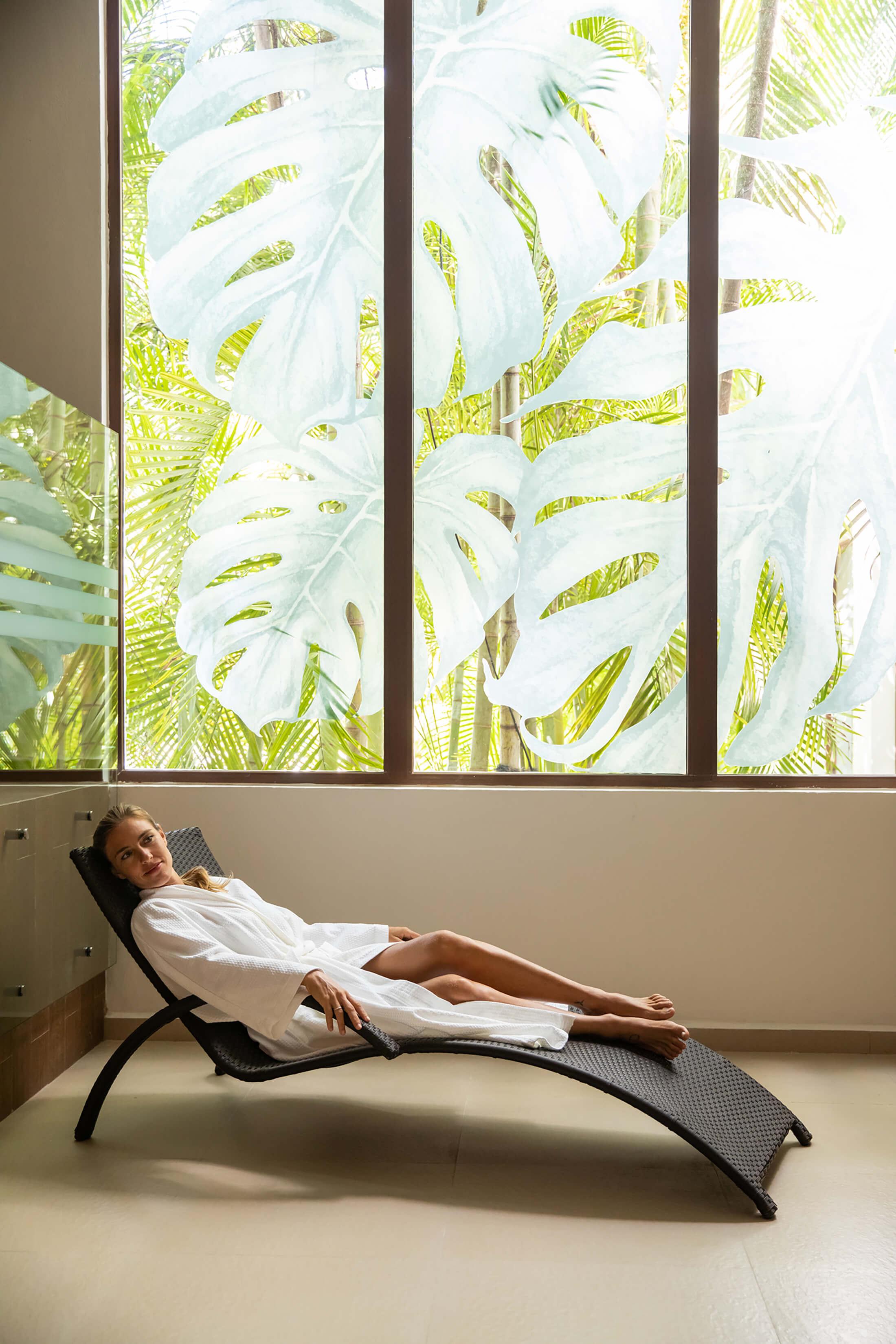 A woman relaxes at a spa