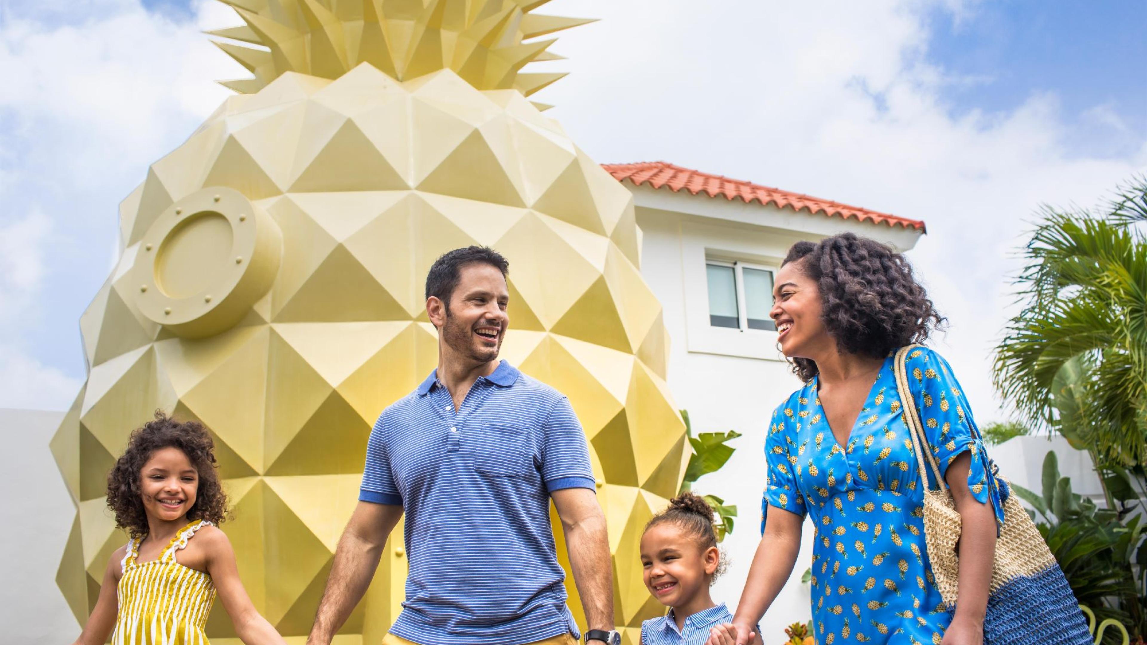 Family in pineapple villa