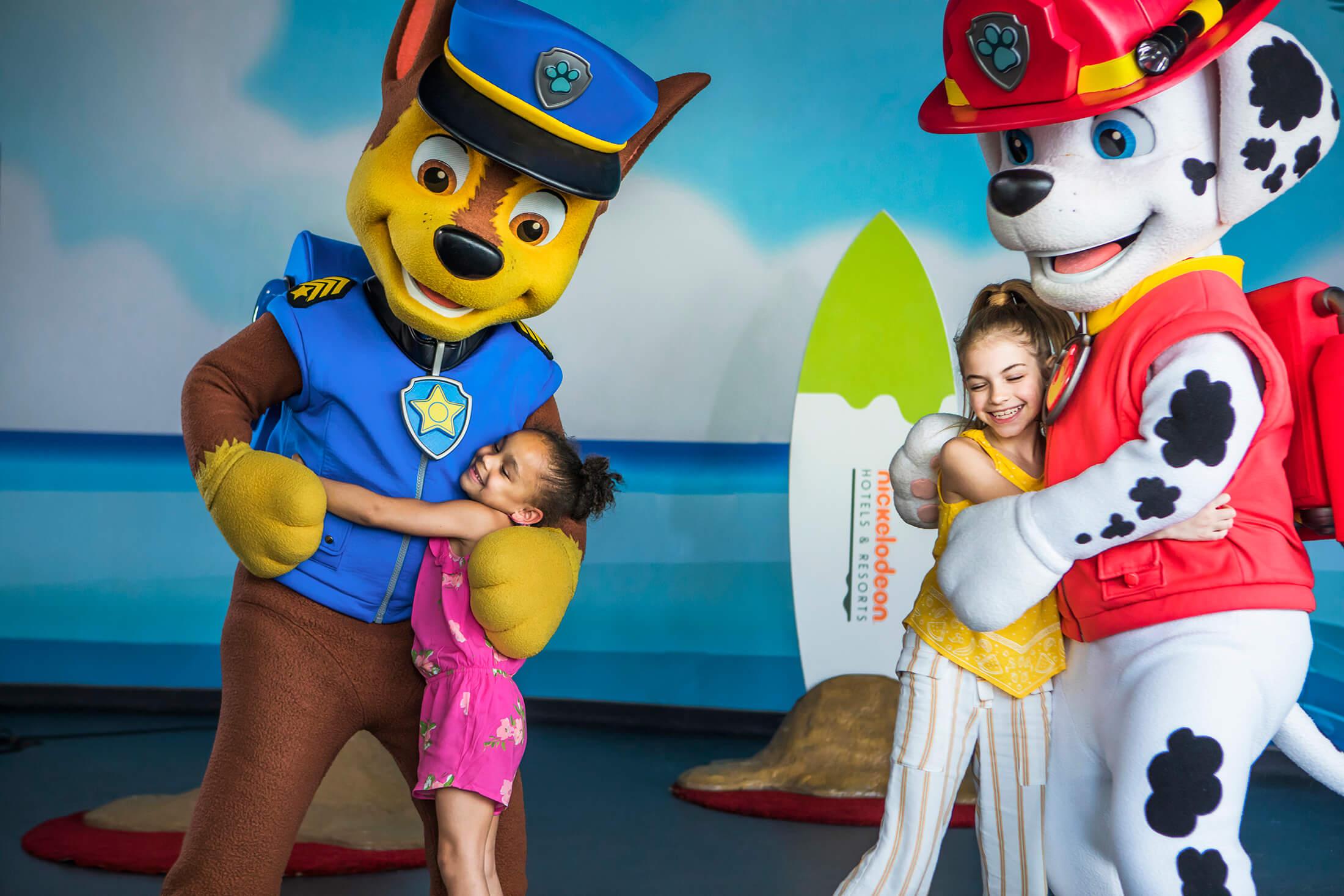 Paw patrol characters posing with child