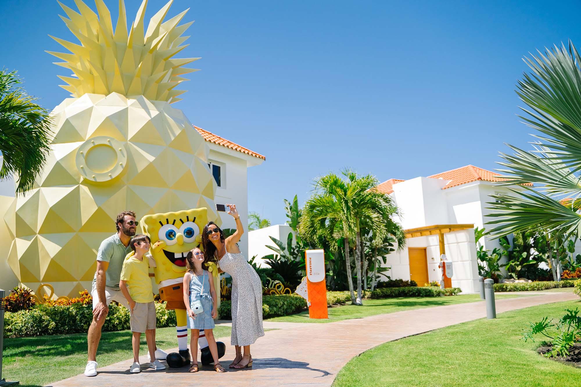 Family in pineapple villa