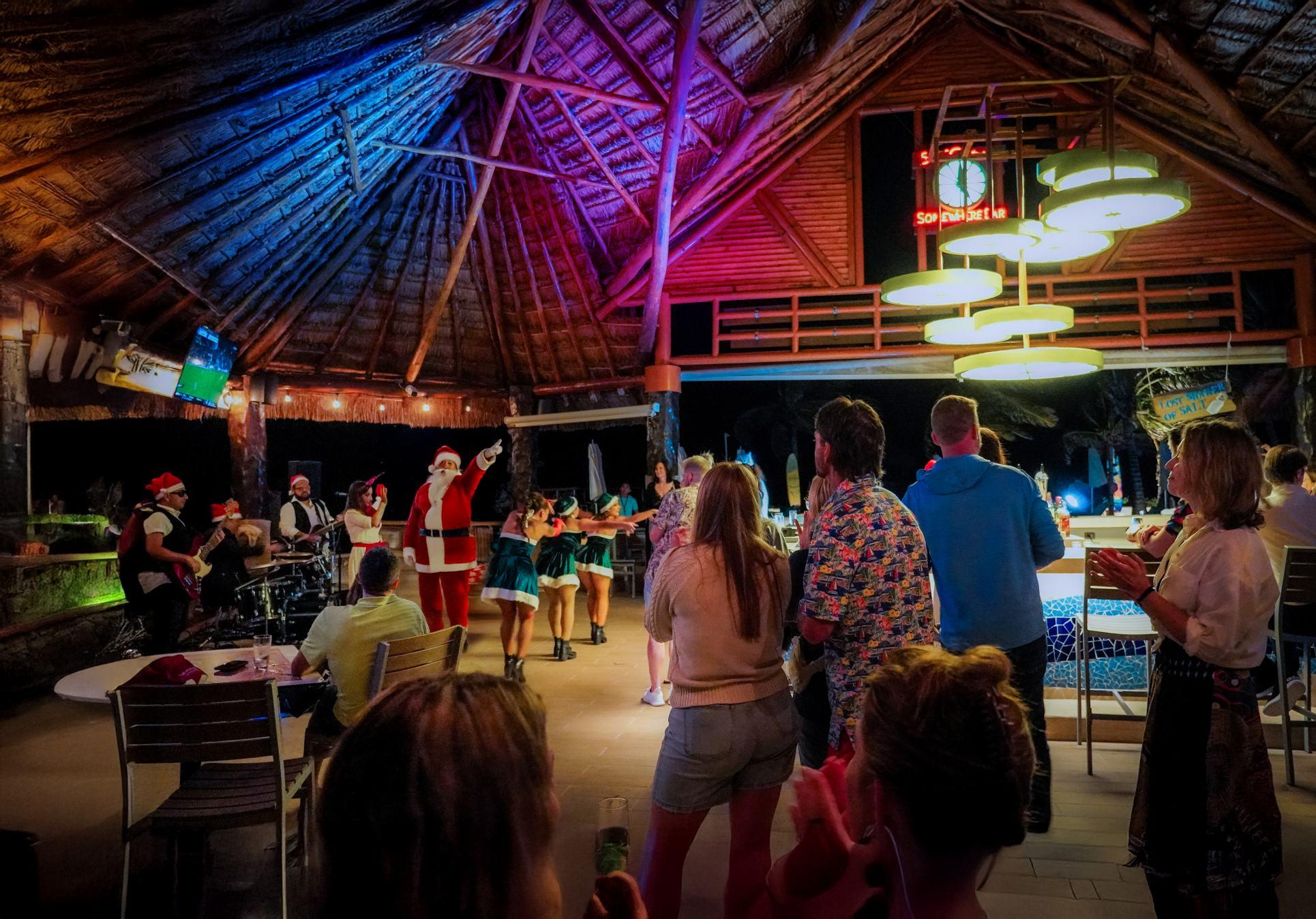musical performance with Christmas costumes in a restaurant
