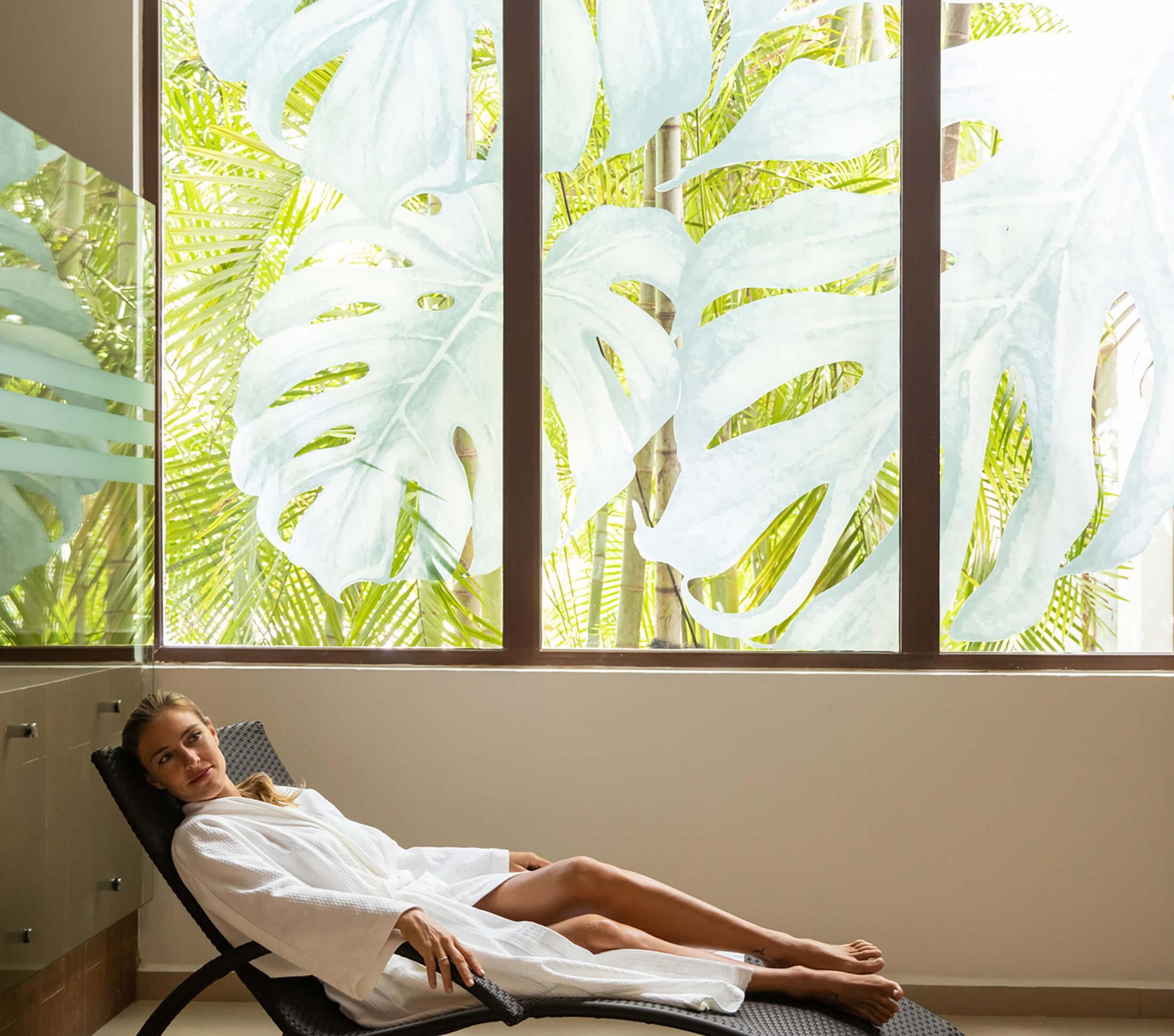 A woman relaxes at a spa