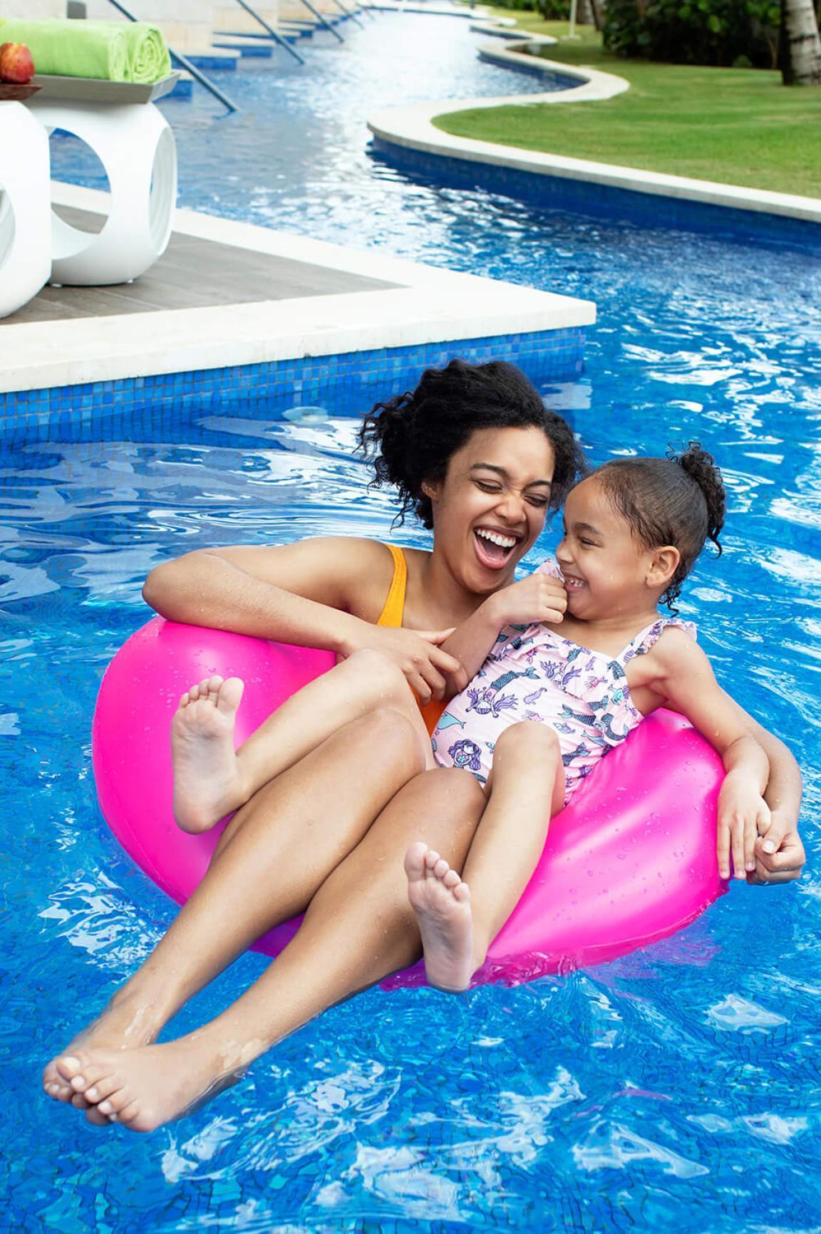 mum and daughter tubing on lazy river